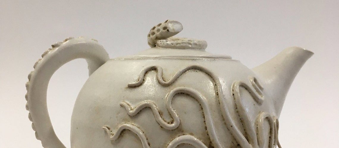 Teapot with creeping octopus and octopus arm handle 1